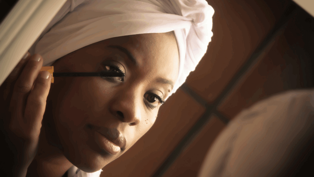 Smiling woman in a white hijab with radiant skin