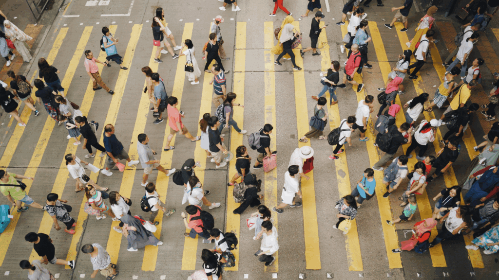 Aerial view of people walking on a city street during daytime
