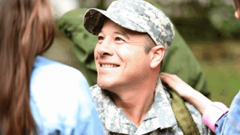 A man in a military uniform with two children