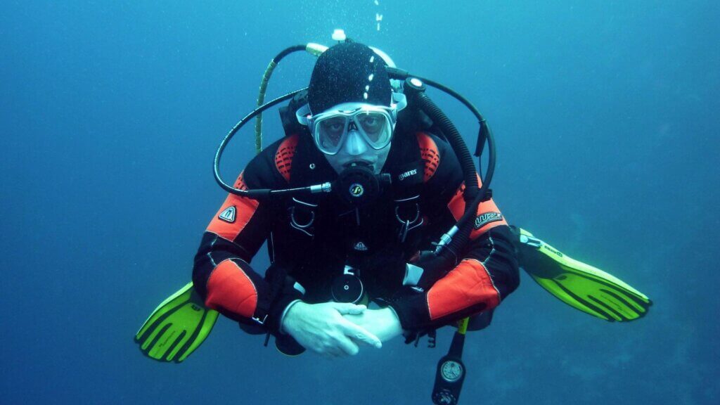 A man scuba diving in the ocean