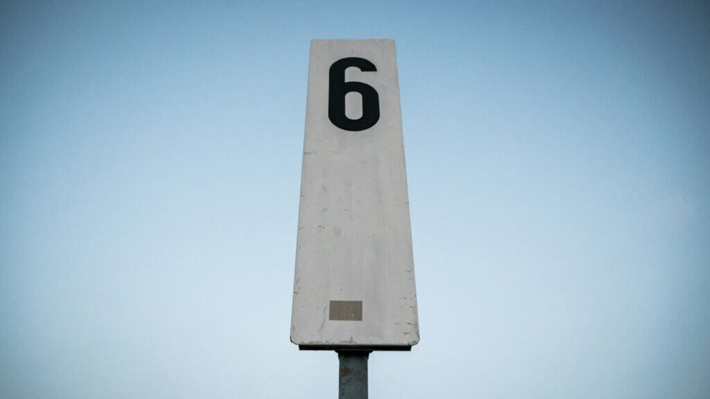 The number 6 on a sign