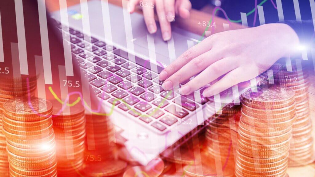 A person typing on a computer with a digital overlay