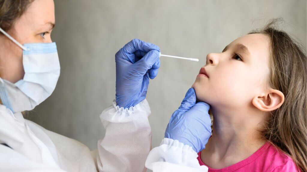 A child having a Covid test done