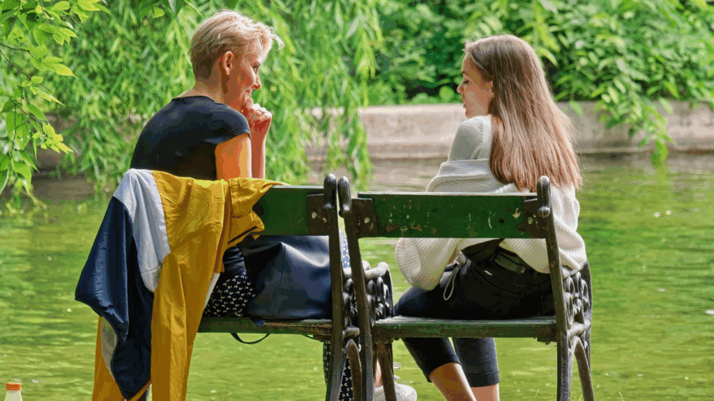 Women talking in park