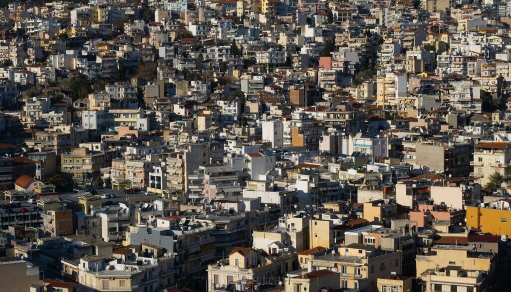 Aerial view of city buildings and houses