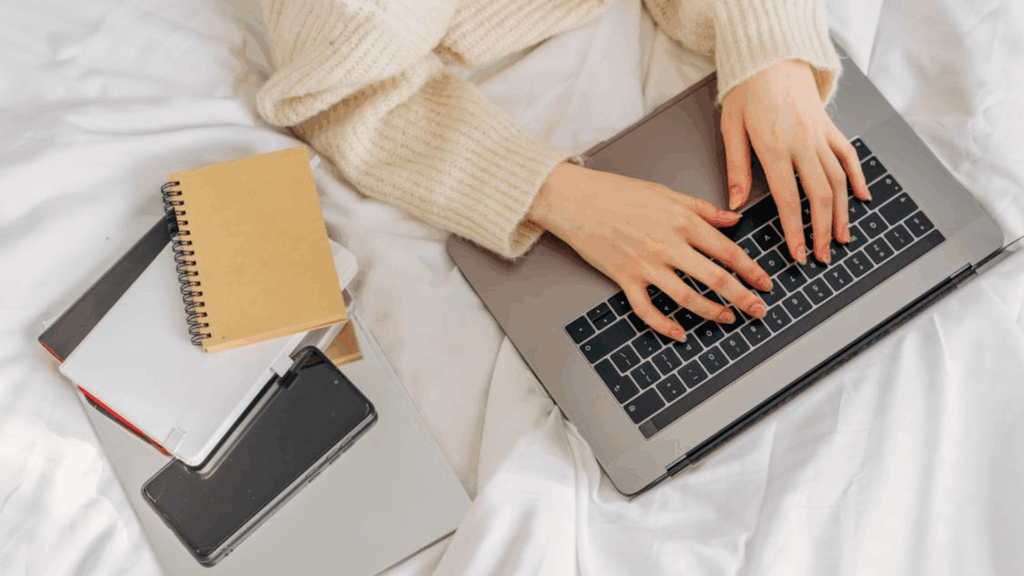 using laptop on bed