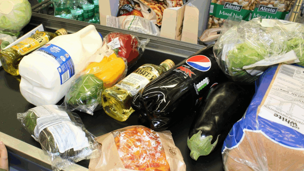 Grocery getting checked out the counter