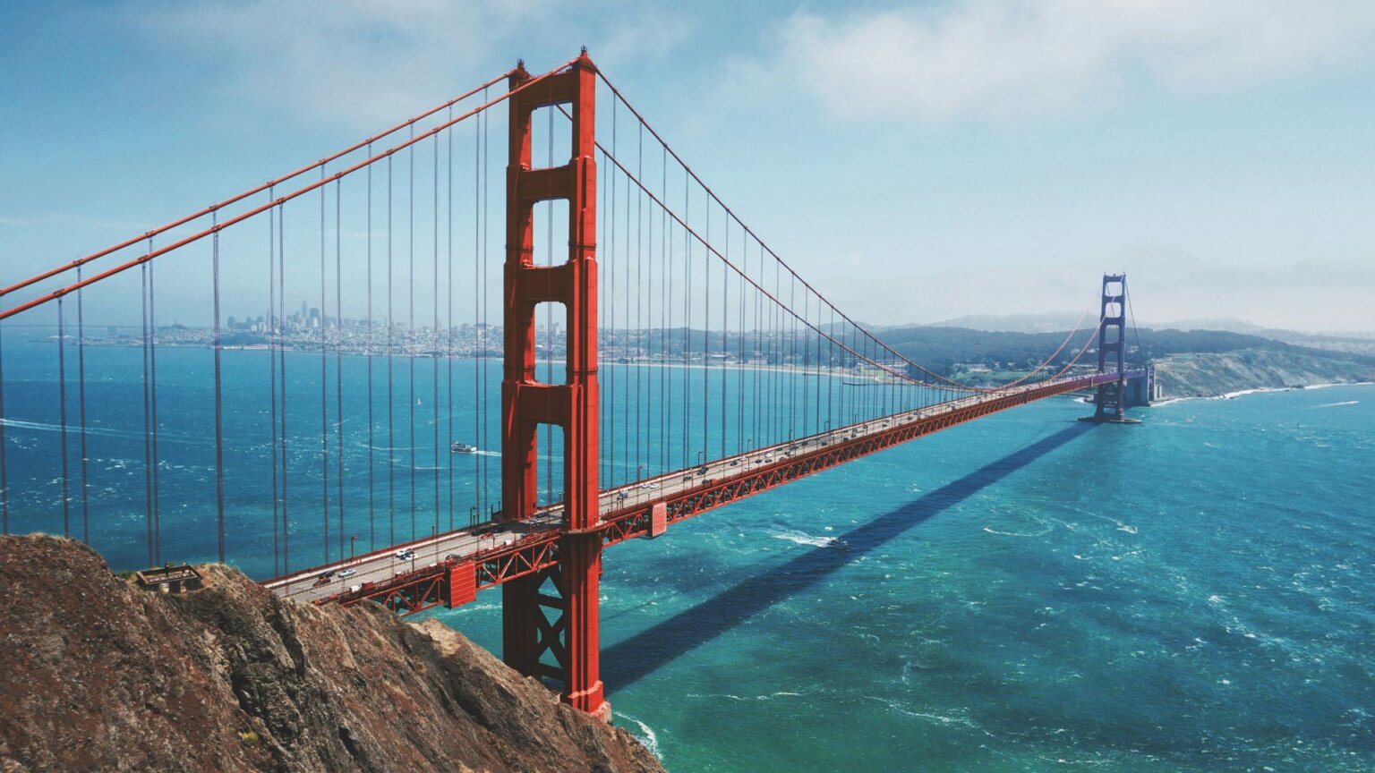 Golden Gate Bridge spanning San Francisco Bay under clear daylight