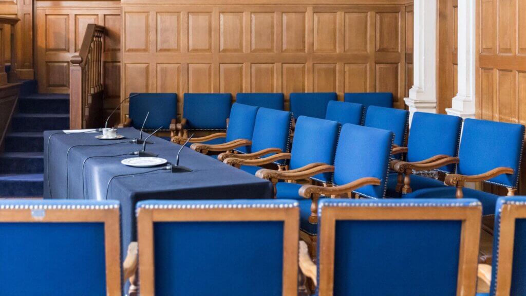 Empty auditorium with seating prepared for a formal public hearing