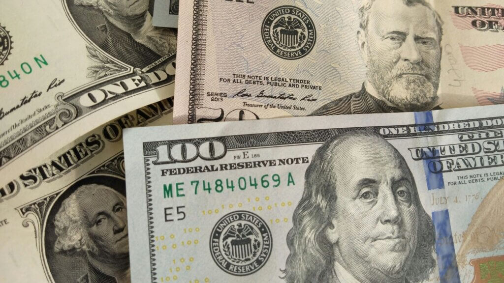 US paper currency showing repeated digits in the serial number