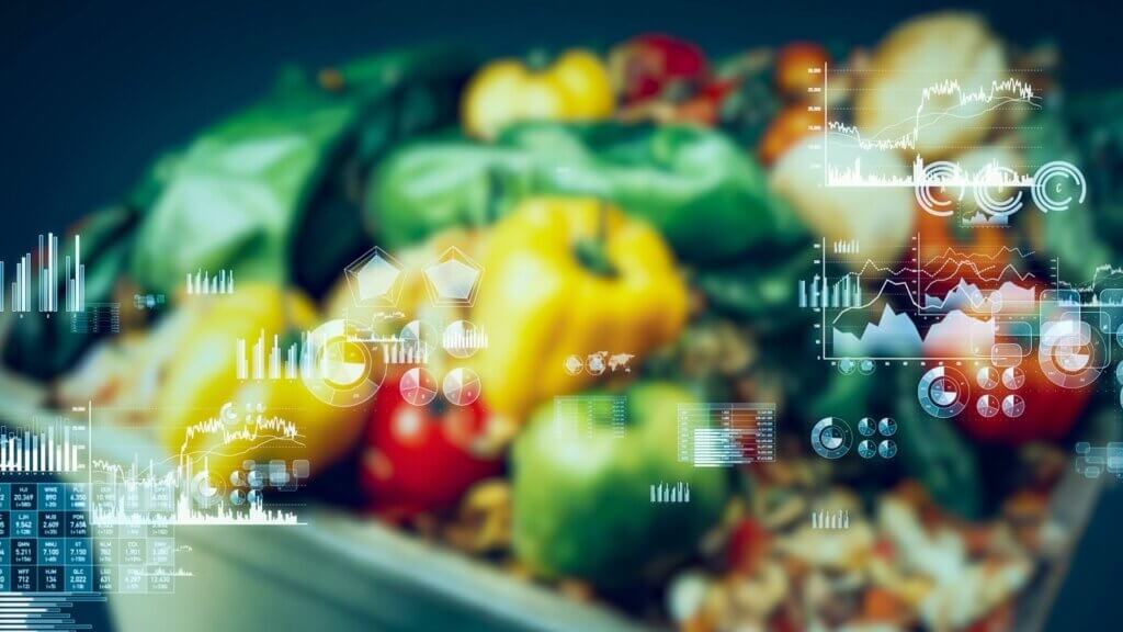 A table of food with digital images in the front
