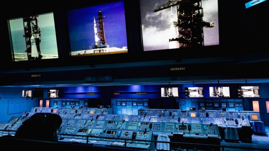 NASA's Control Station displaying control panels, countdown clocks and communication devices