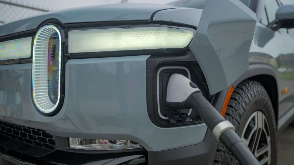 Rivian plugged into charging cable