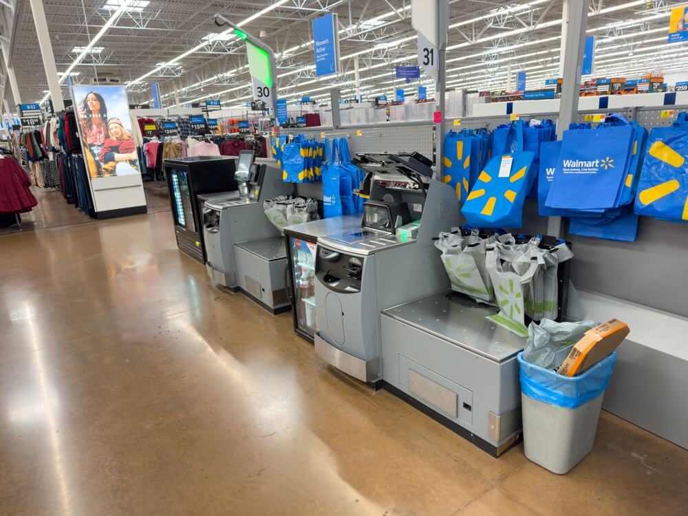 Empty self-checkout registers inside Walmart