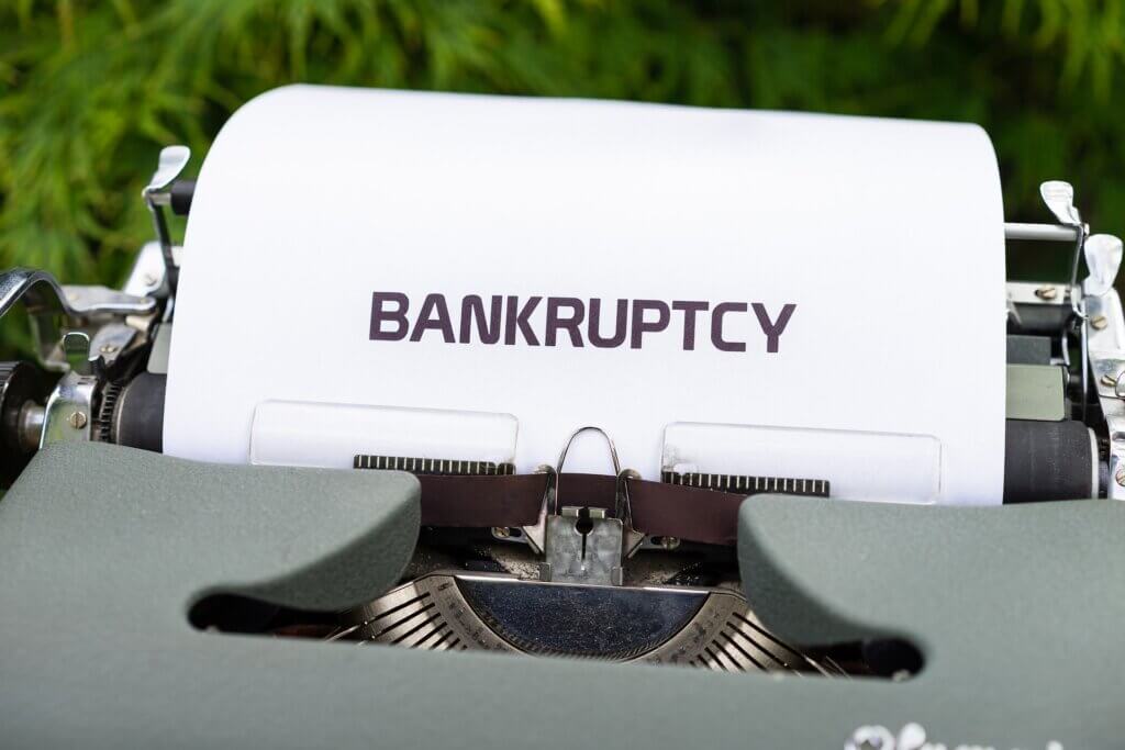 Bankruptcy written on paper in a typewriter