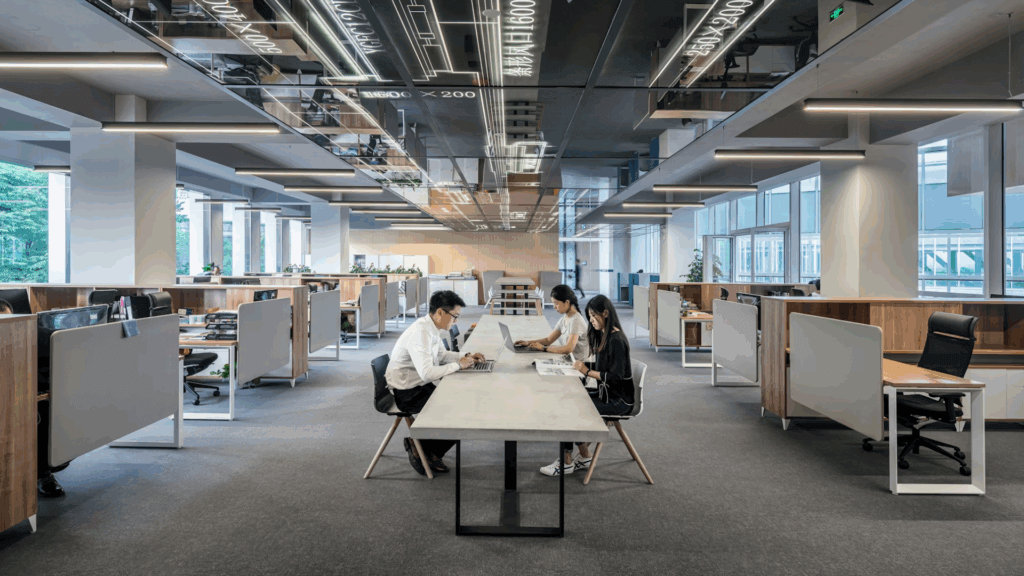 people working in an almost empty office