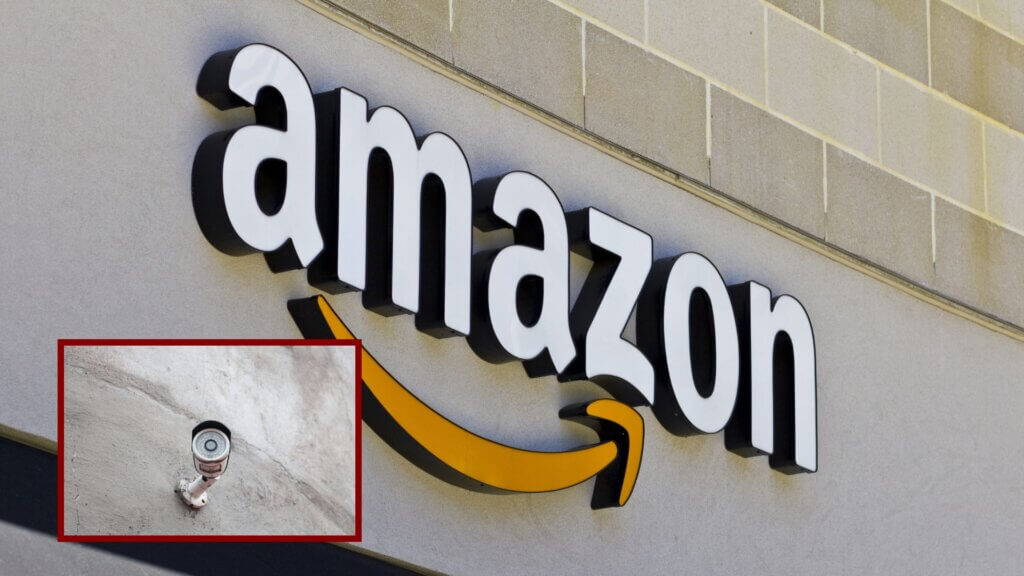 Amazon logo displayed on the side of a building next to a mounted outdoor security camera