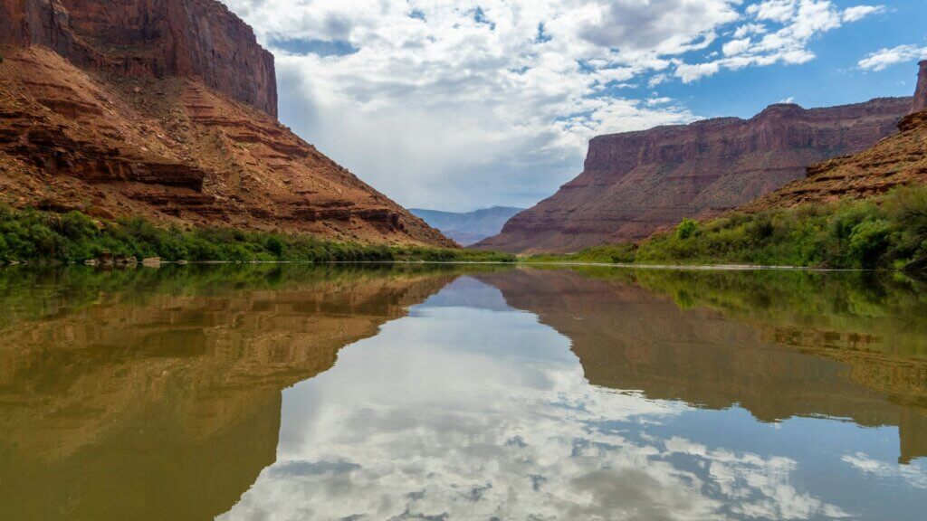 Western reservoir surrounded by desert mountains.