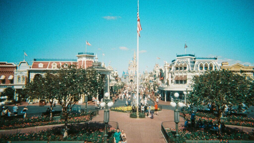 Sunny view of Magic Kingdom Park with buildings and walkways in Bay Lake, Florida