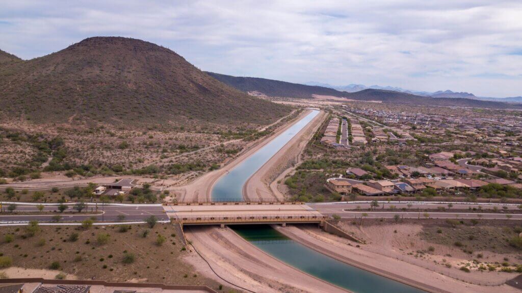 Aerial view of CAP canal crossing arid land.