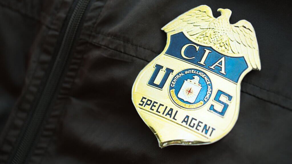 Close up of a US CIA badge on a black jacket uniform