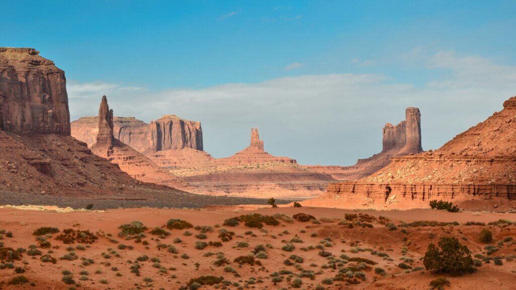 Monument Valley rock formations in desert landscape.