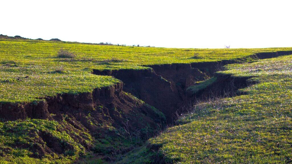 Exposed fault line cutting through rocky land
