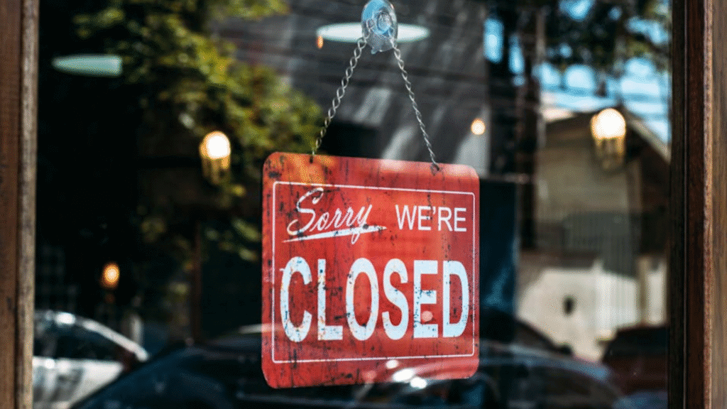 "sorry, were closed" sign