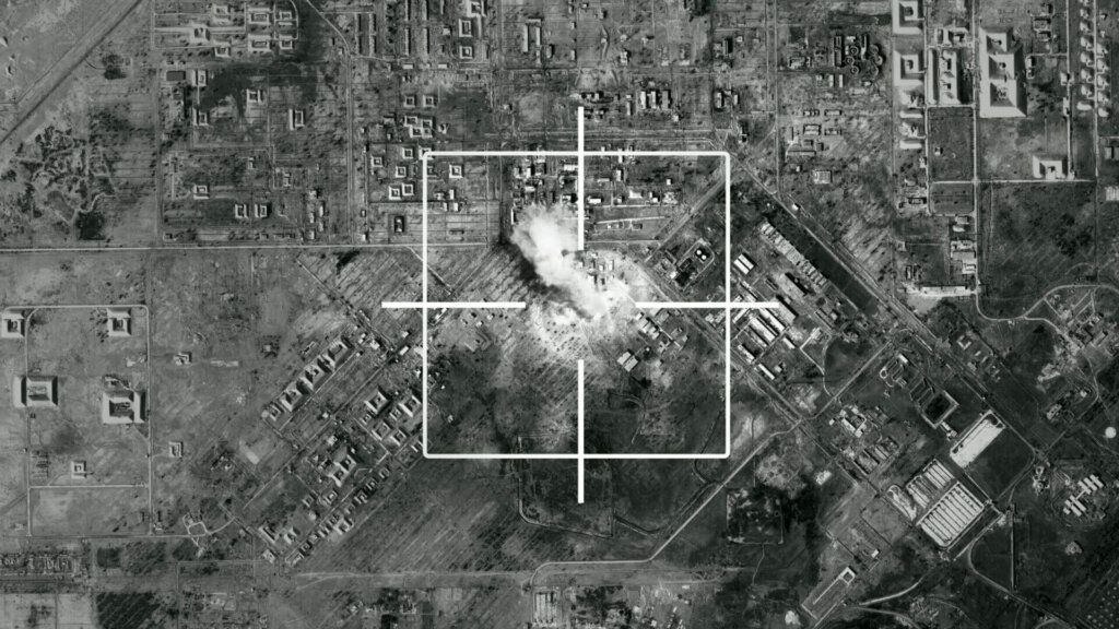 Satellite view graphic showing a missile target marker over a city map.