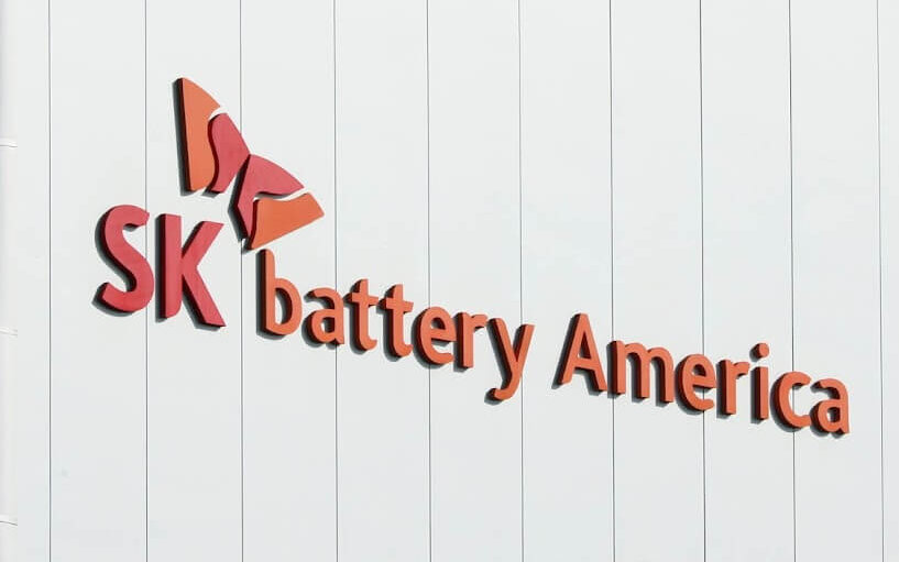 SK Battery America logo on exterior of battery manufacturing facility.