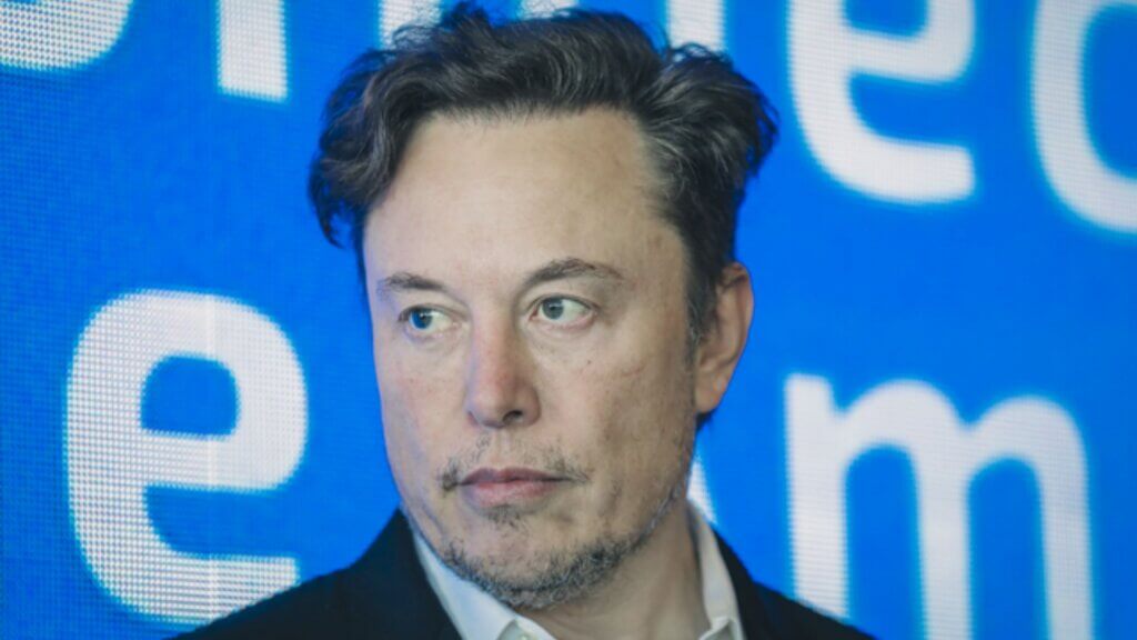 Businessman Elon Musk speaking at an event.