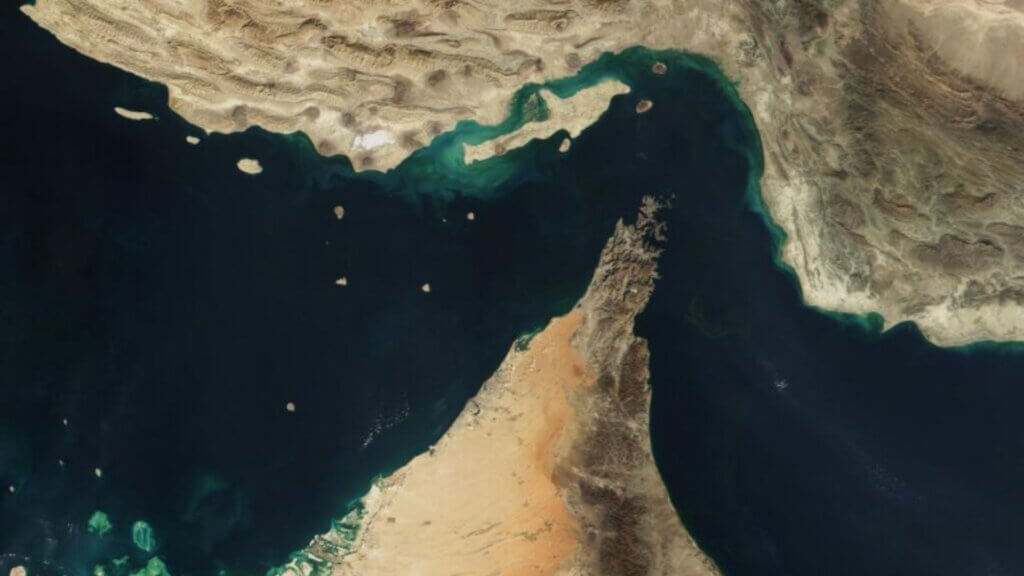 Satellite view of the Strait of Hormuz between Iran and the Arabian Peninsula, a key global oil shipping route.