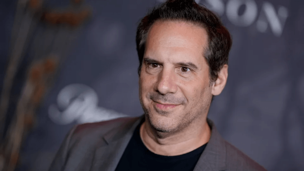 A close-up headshot of comedian Seth Herzog.