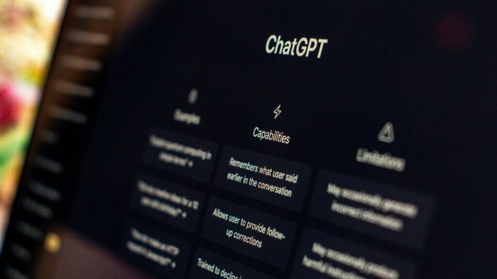 ChatGPT displayed on a computer screen with capabilities and limitations listed.