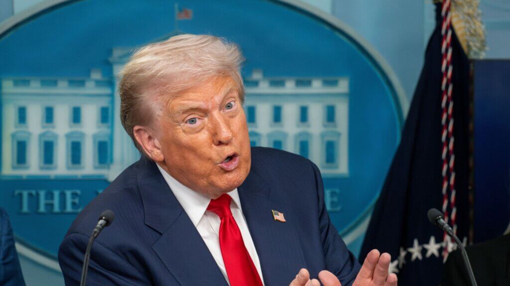 Donald Trump speaking during a press briefing at the White House.