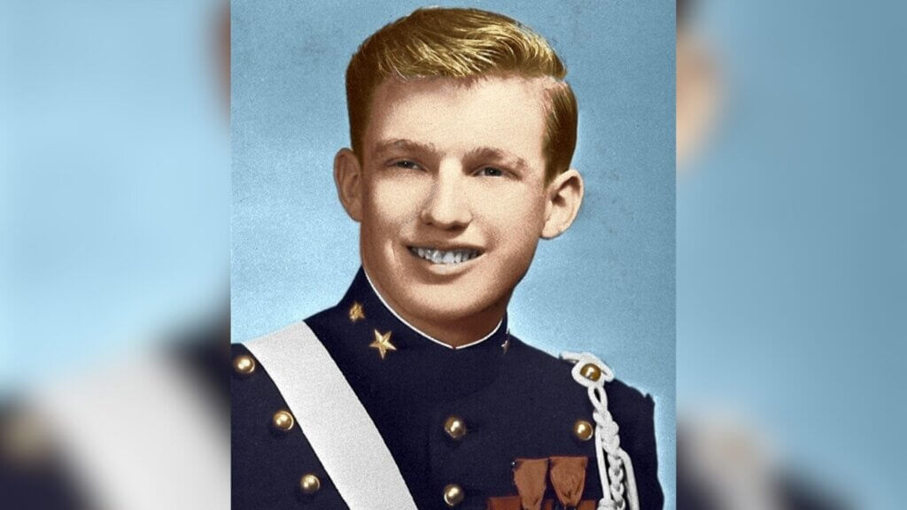 Young Donald Trump in military academy cadet uniform in a formal portrait.
