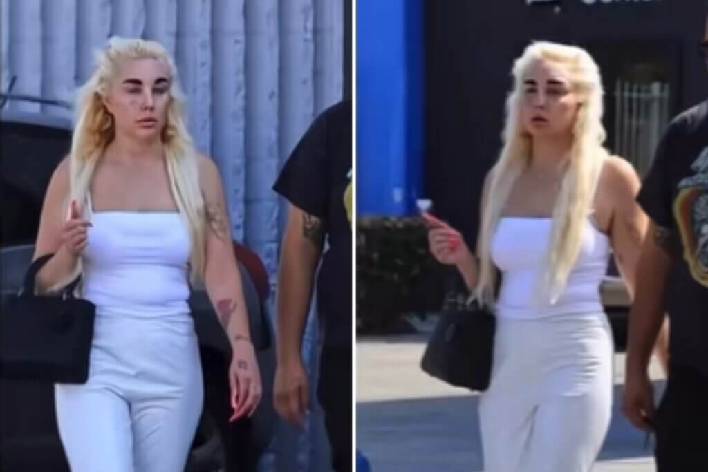 Amanda Bynes in a white sleeveless top and pants on a walk, as photographed by paparazzi. Amanda made a post of these photos to share she has lost 36 lbs.