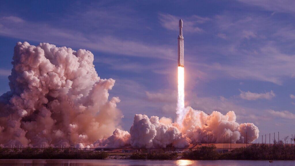 Space X rocket launch to space view from far away.