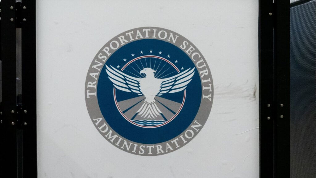 A sign with the seal of the Transportation Security Administration is seen in an airport.