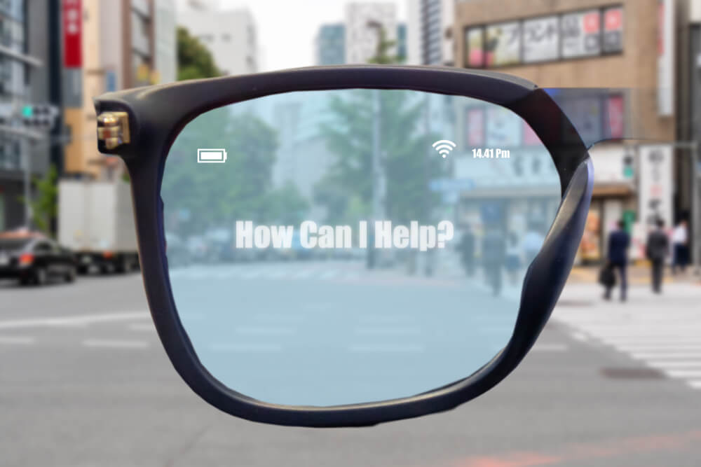 Augmented reality display on smart glasses displaying an AI prompt over a city street view.