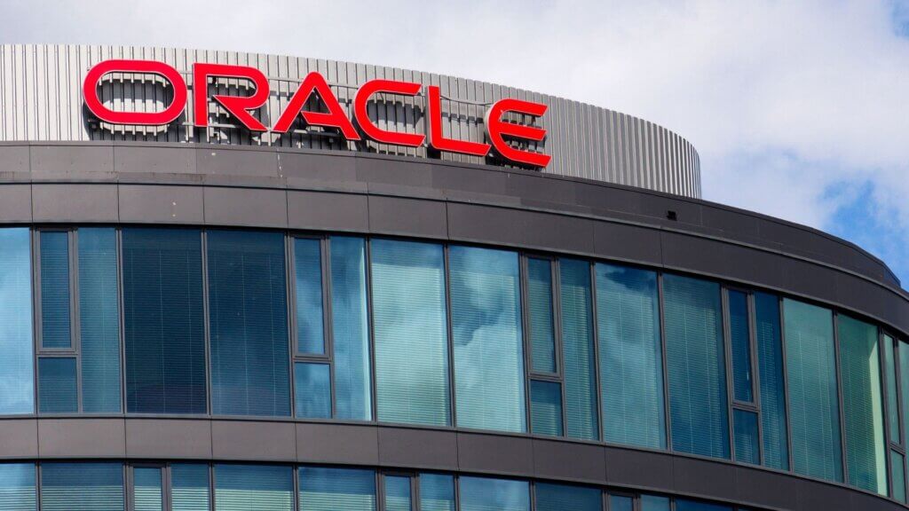 Oracle logo displayed on the exterior of a company office building.