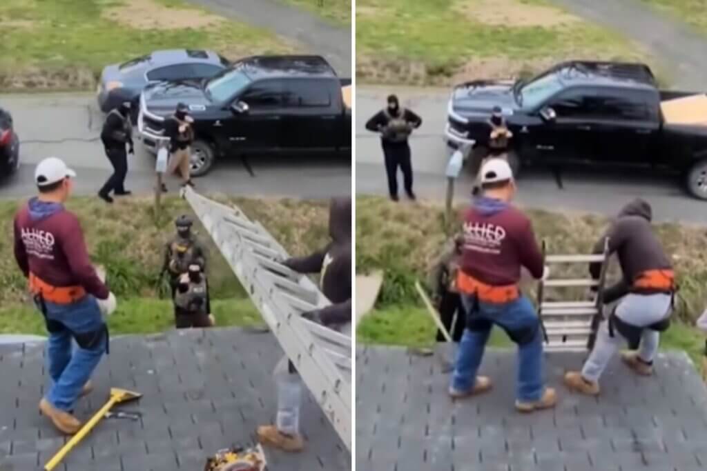 Workers coming down the roof of the Maryland home as ICE agents arrive in the property as captured in the viral video clip.
