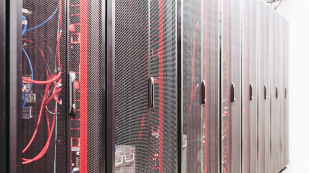 A row of server racks in a data center.