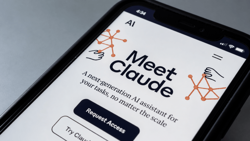 Close-up of smartphone screen showing “Meet Claude” page with request access button for AI assistant.