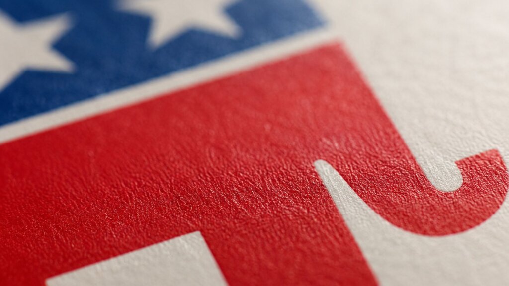 Close up of the Republican Party elephant logo in red, white, and blue with part of a white star visible above it.