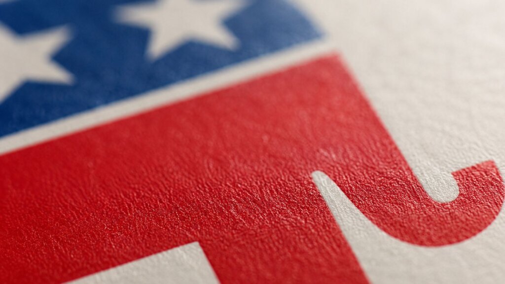 Close up of the Republican Party elephant logo in red, white, and blue with white stars across the top.