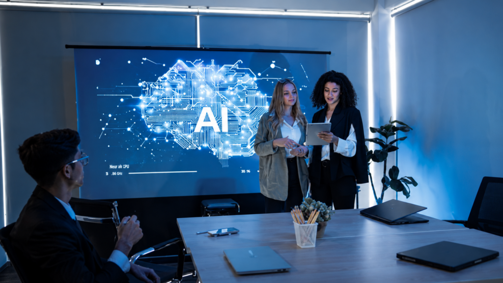 Two professionals delivering a presentation on artificial intelligence next to a large projector screen in a dimly lit conference room.