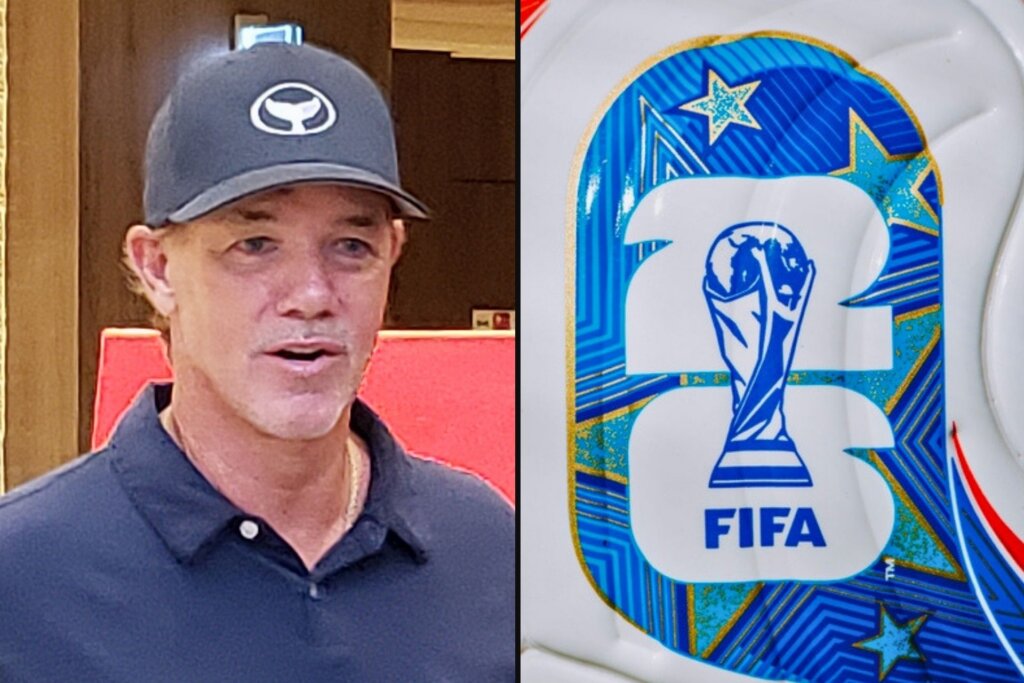 Artist Robert Wyland beside a FIFA Club World Cup trophy logo displayed on commemorative event merchandise.