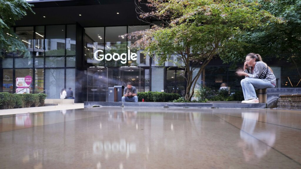 Google´s company backyard and people talking over the smartphones.