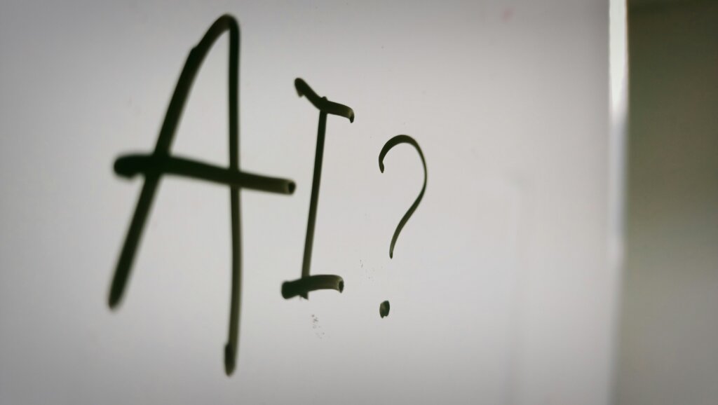 AI written on a whiteboard.